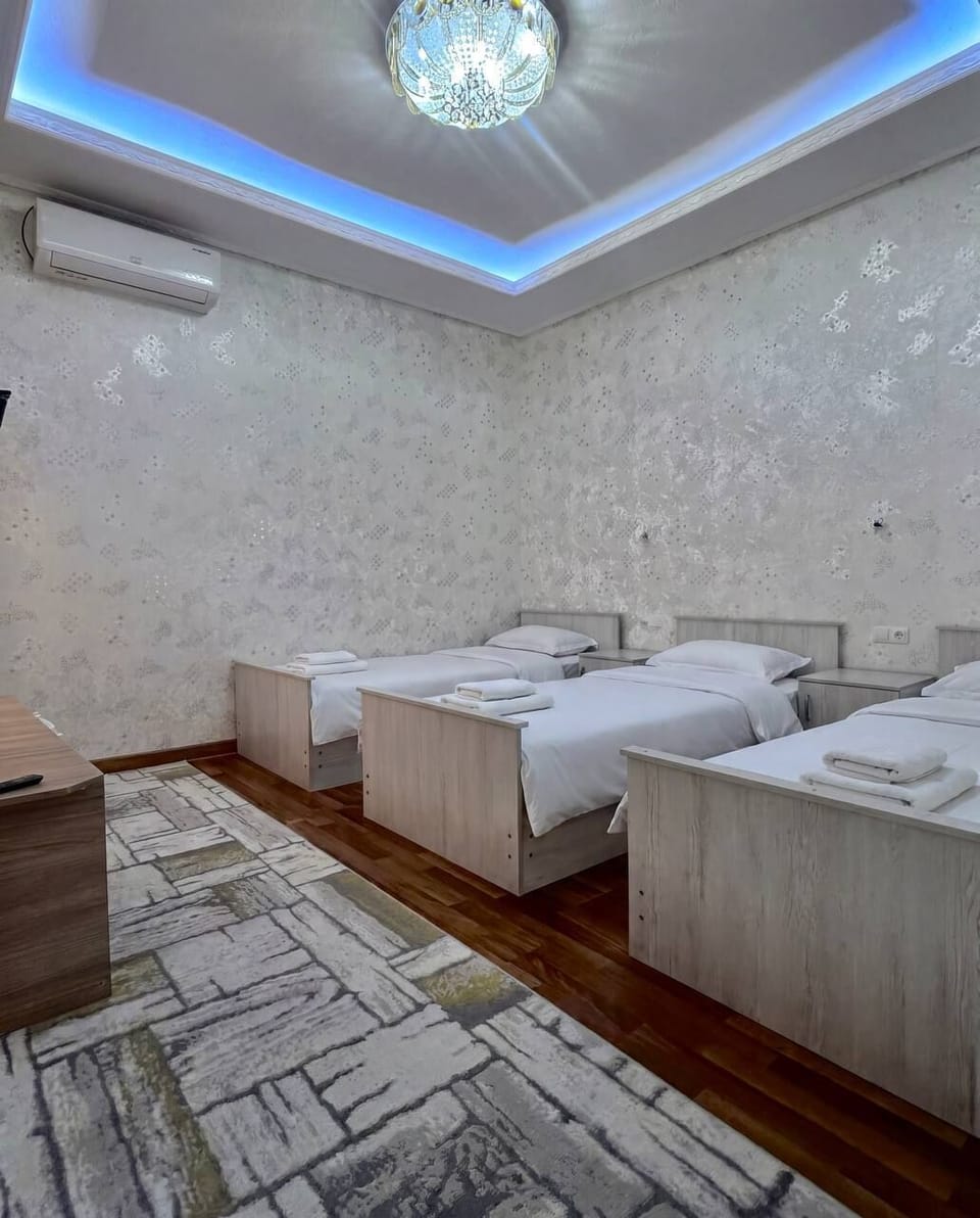 Deluxe Triple Room, Garden View | Laptop workspace, iron/ironing board (on request), WiFi (free)