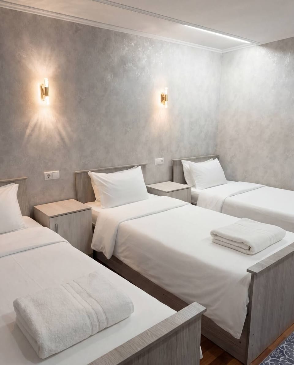 Comfort Triple Room | Laptop workspace, iron/ironing board (on request), WiFi (free)