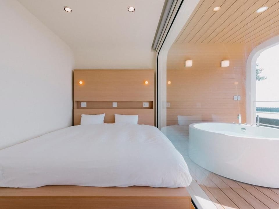 Quadruple Room, Ocean View (N01) | Desk, WiFi (free), bed sheets