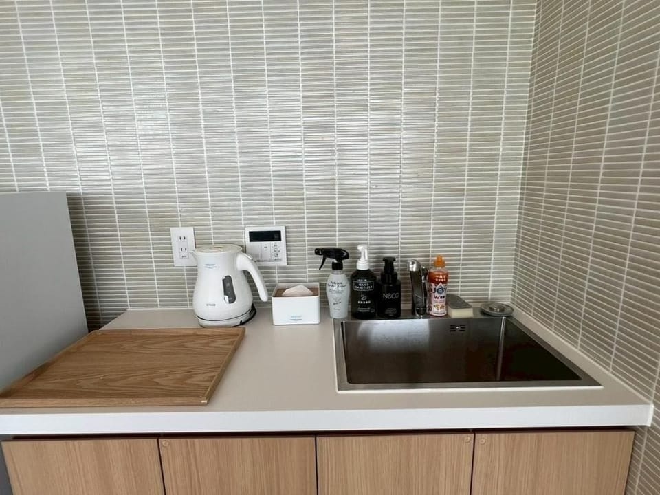 Deluxe Quadruple Room, Non Smoking, Ocean View (N05) | Private kitchen | Fridge, griddle, cookware/dishes/utensils