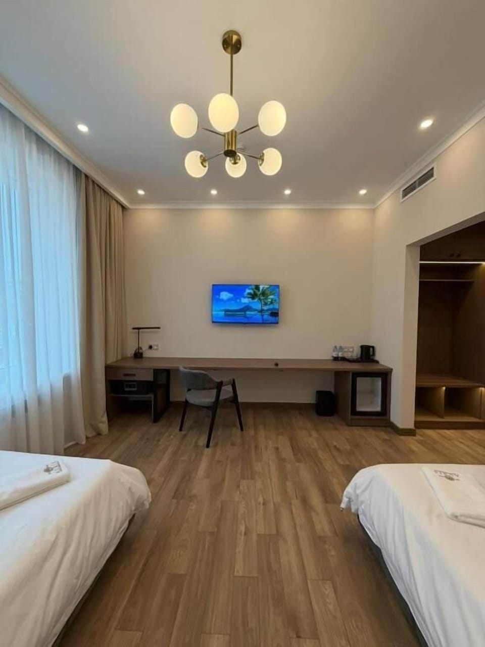 Deluxe Double Room, Mountain View | In-room safe, desk, laptop workspace, soundproofing