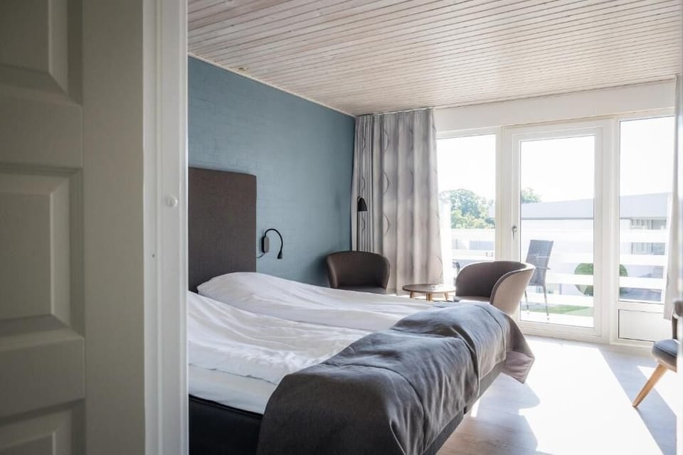Basic Triple Room, Balcony | Laptop workspace, free WiFi, wheelchair access