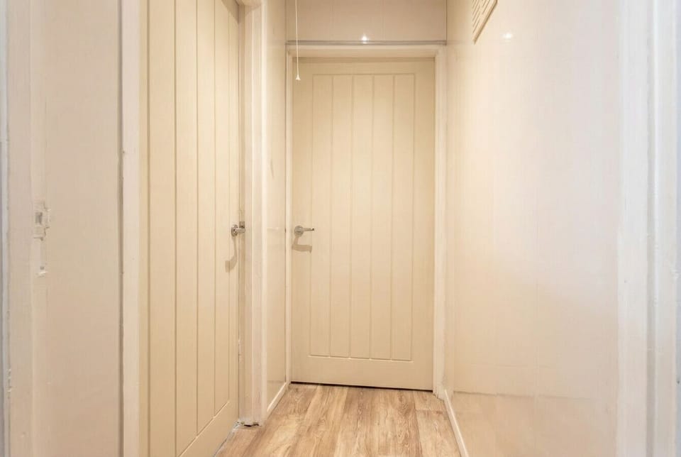 A bright, clean entrance hallway welcomes you in and sets the tone for a well-presented, comfortable stay.