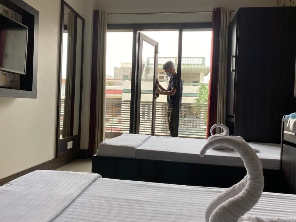 Twin Room, Balcony, Garden View | Desk, laptop workspace, free WiFi