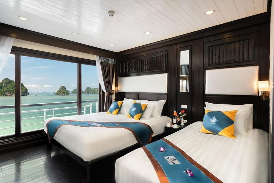 Executive Triple Room, Balcony, Ocean View | Desk, blackout drapes, soundproofing, iron/ironing board