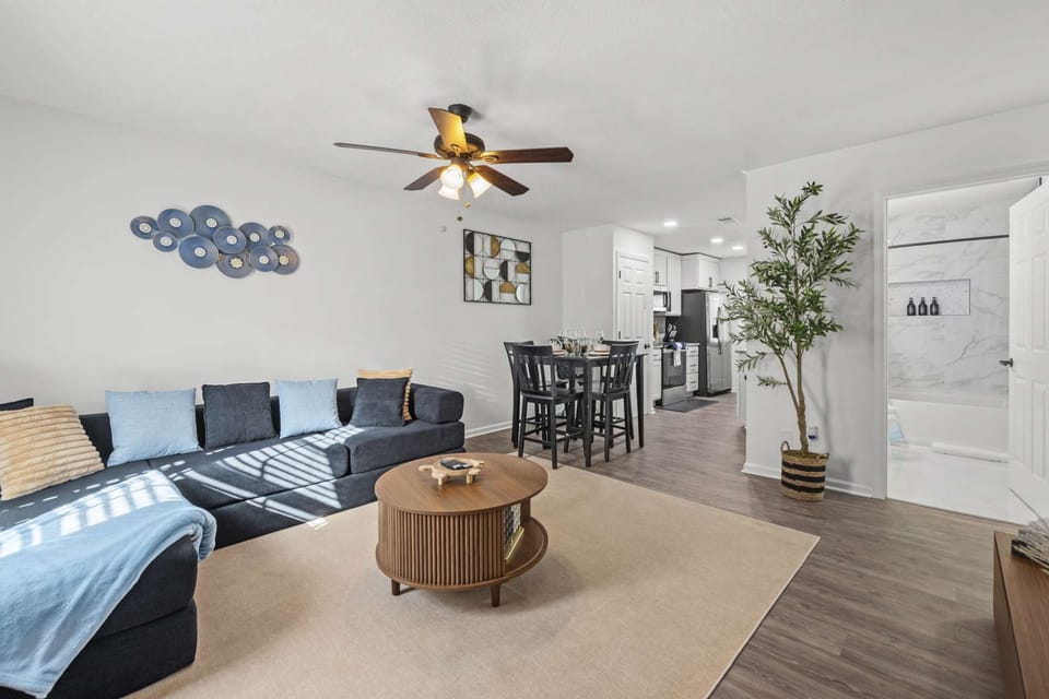 Settle into this sun-filled living room — the perfect place to relax, stream your favorites, and enjoy cozy moments together.