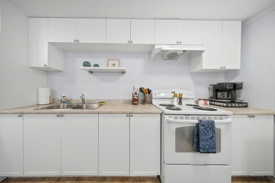 Fully equipped kitchen — whether it’s morning coffee or a cozy dinner in, you’re covered.