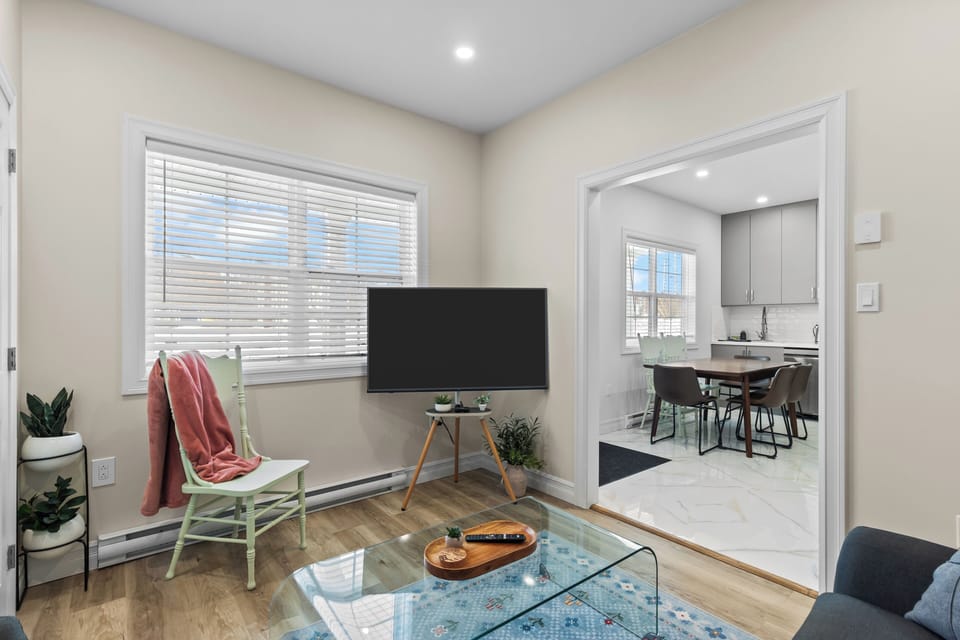 Cozy living area with Smart TV and comfortable seating for relaxing nights