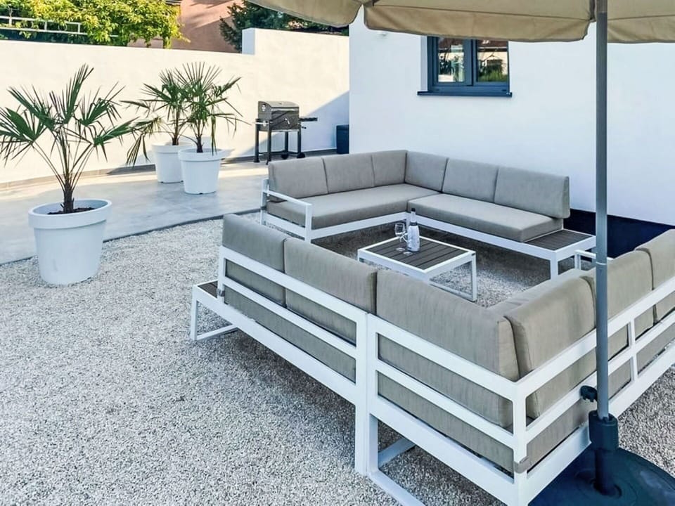 Furniture, Outdoor Furniture, Table, Floor, Flooring, Composite Material, Couch, Chair