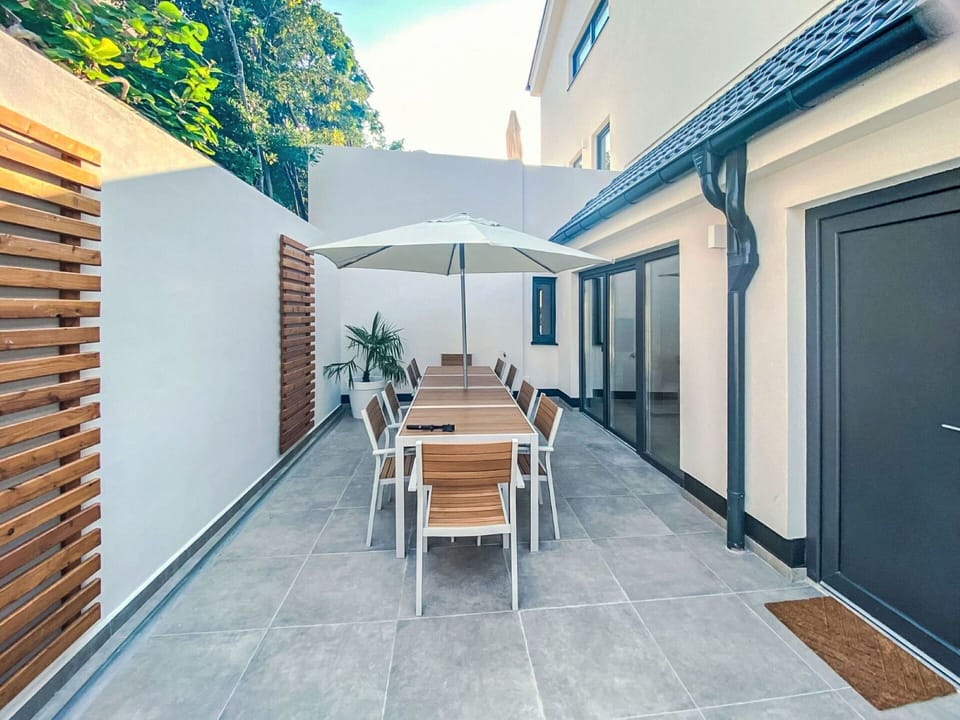 Flooring, Floor, Interior Design, Home, Composite Material, Door, Outdoor Furniture, Hardwood, Chair, Shade