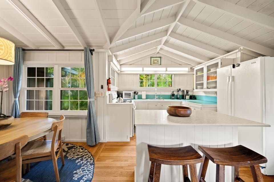 Seating for 5, kitchen island for 2