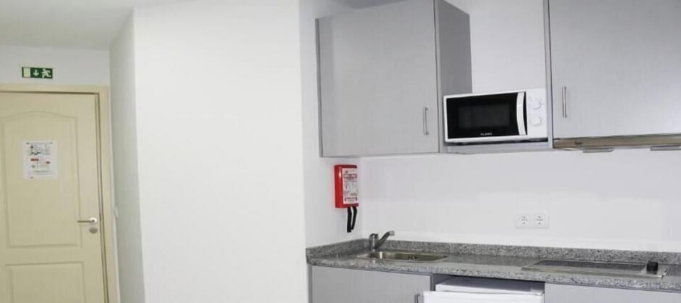 Suite, Balcony | Private kitchen