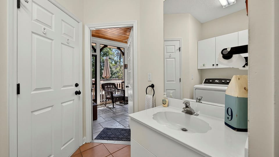 One door from Outside Right to Laundry Room