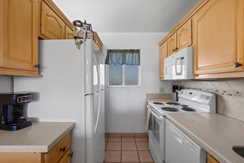 Condo, 2 Bedrooms | Private kitchen | Coffee/tea maker, fridge, oven, toaster