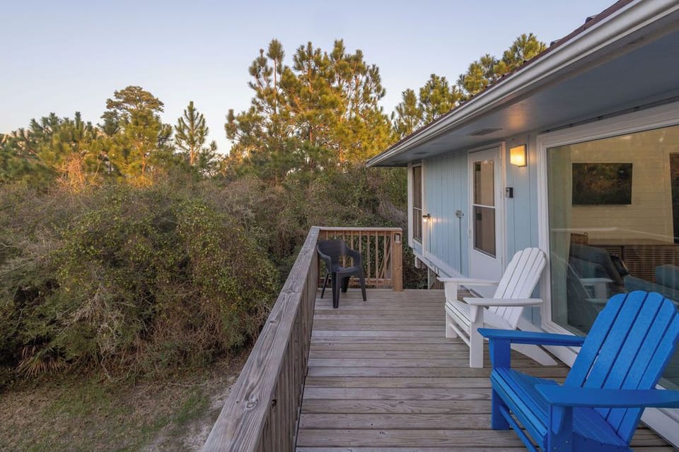 Porch/Balcony - Enjoy gorgeous Little Lagoon views from the spacious balcony, which includes comfortable, Poly-deck seating for convenience.
