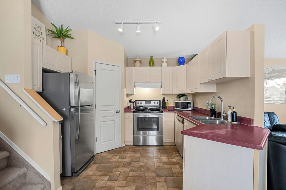 Fully equipped kitchen with essentials for cooking meals during your stay.