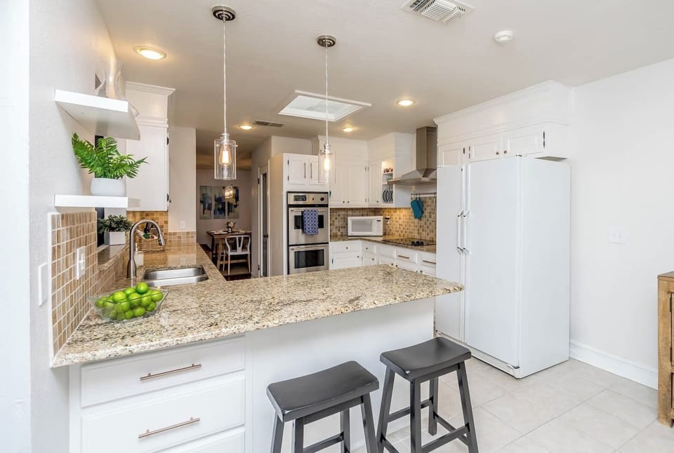 Kitchen helpers and spectators have a spot to sit.