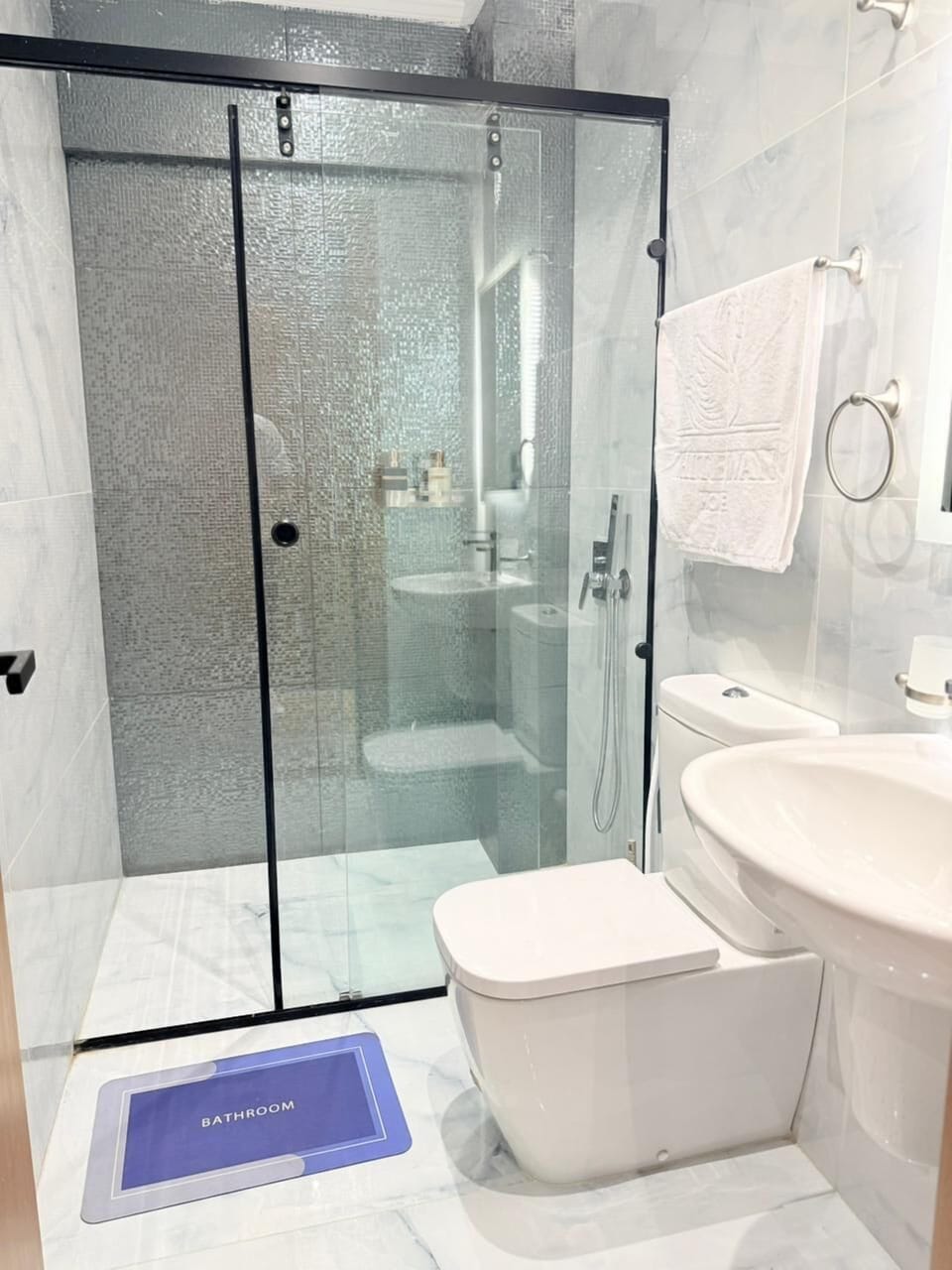 Hair dryer, towels, soap, shampoo