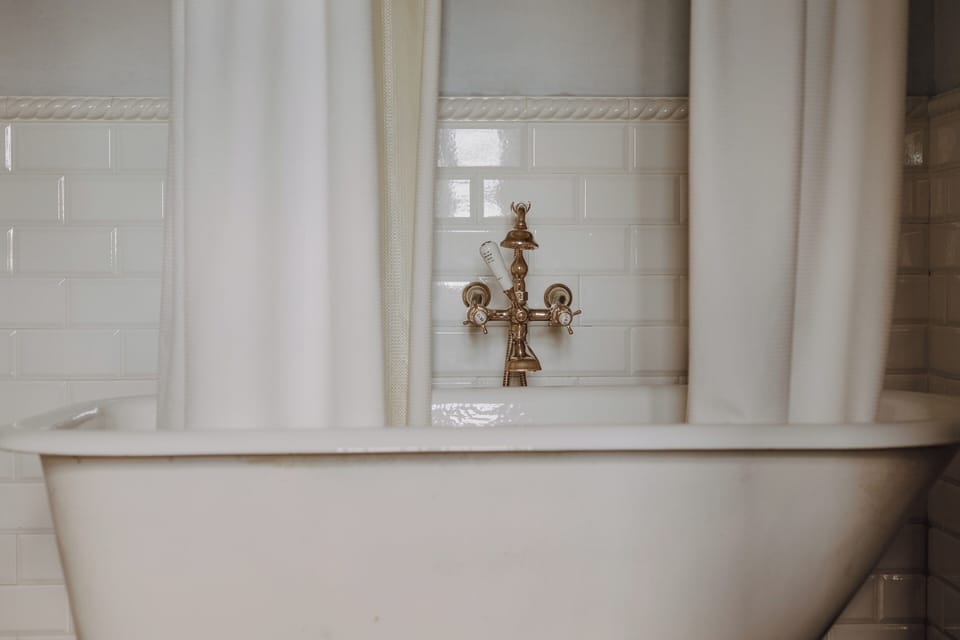 Standard Double Room, Balcony, Garden View | Bathroom | Separate tub and shower, deep soaking tub, rainfall showerhead