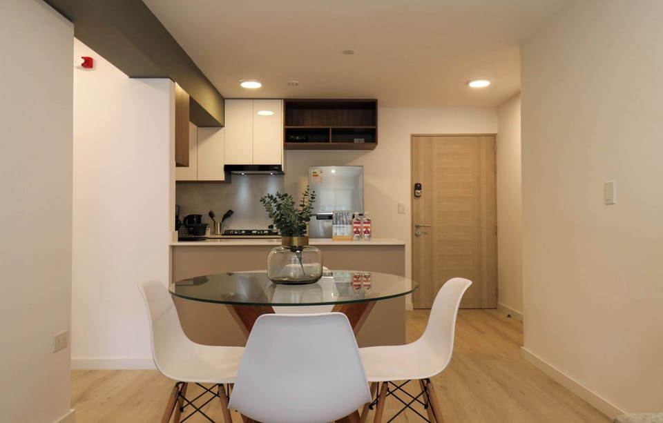Dining table set for meals, perfect for two guests.