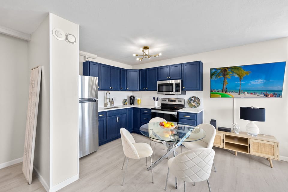 Beautiful Blue Dining Area and Kitchen.