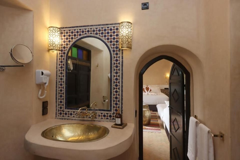 Comfort Suite, Patio, Pool View | Bathroom | Slippers