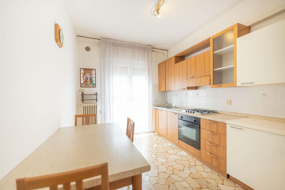 Apartment | Private kitchen | Fridge, stovetop, cookware/dishes/utensils, dining tables
