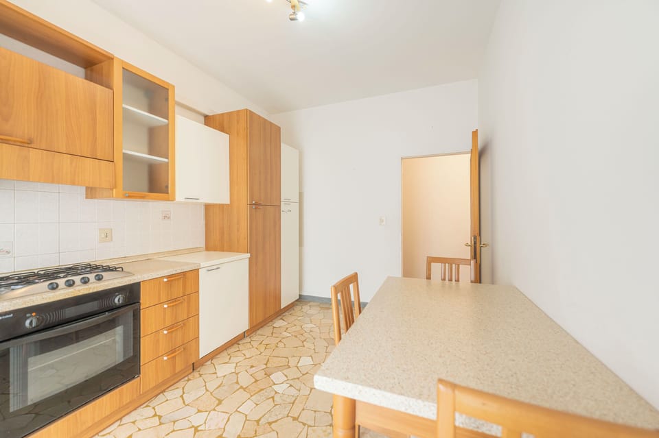 Apartment | Private kitchen | Fridge, stovetop, cookware/dishes/utensils, dining tables