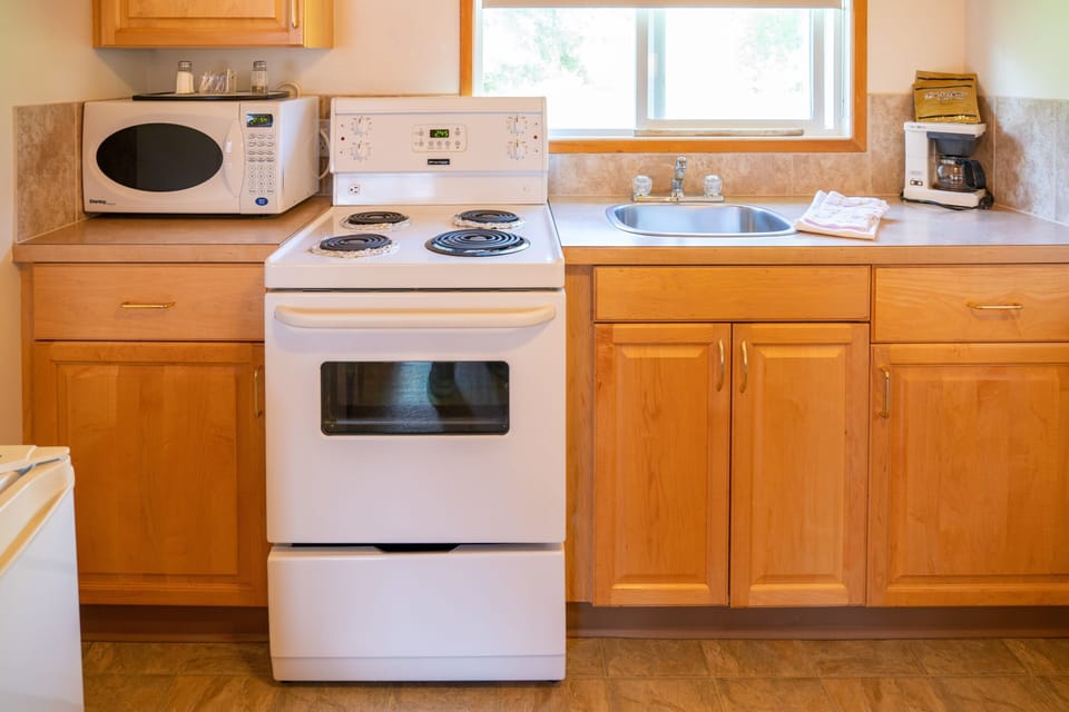 Cook a delicious meal in the kitchen.