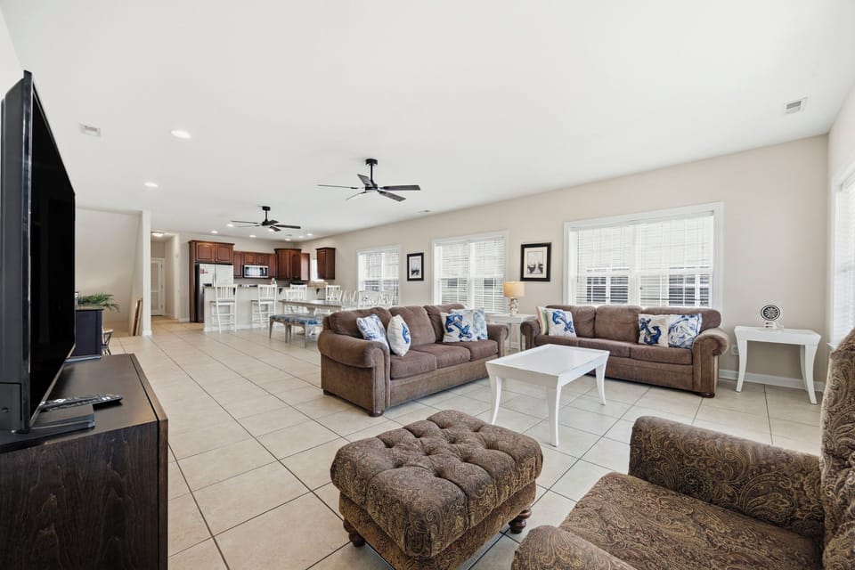 Open-concept living, dining & kitchen space
