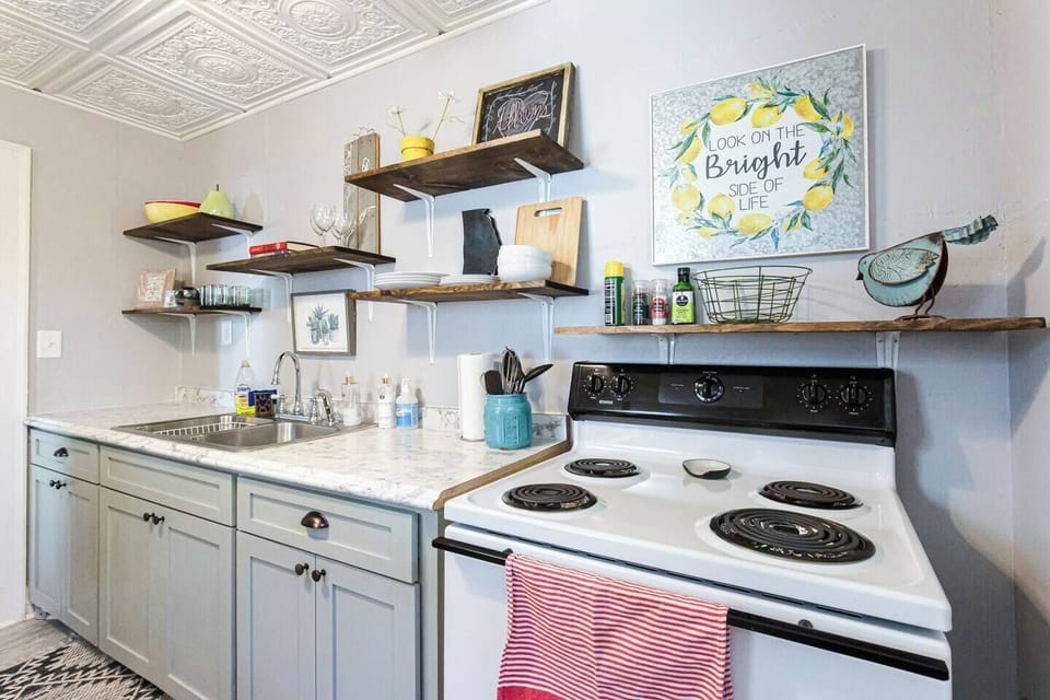 Full kitchen with open shelving and all the amenities you will need on your trip.