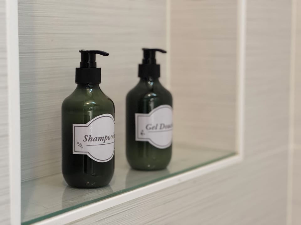 Deluxe Double Room | Bathroom amenities | Slippers