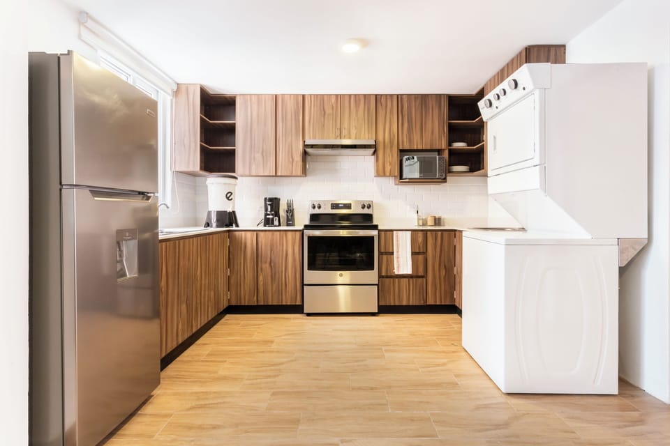 Family Apartment | Private kitchen | Fridge, microwave, oven, stovetop