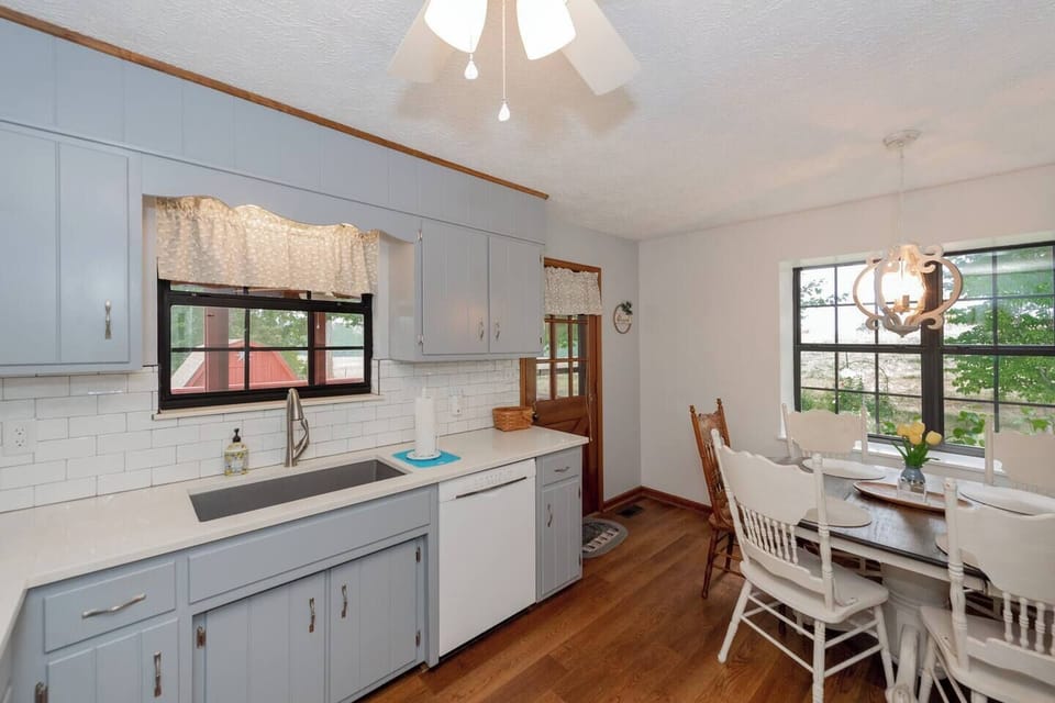 Kitchen: Bright, airy space with modern touches, perfect for culinary adventures and meals!