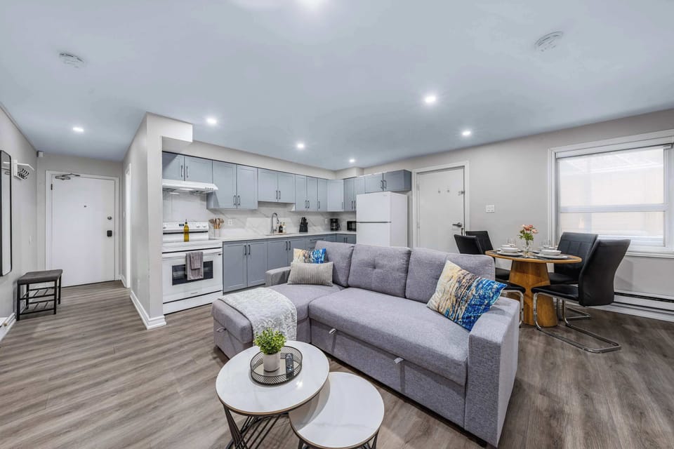 Bright open living space with kitchen and dining.