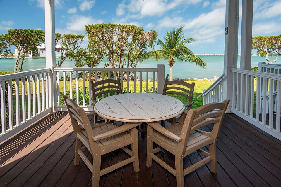 There is a balcony on each level of this two-story townhome villa.