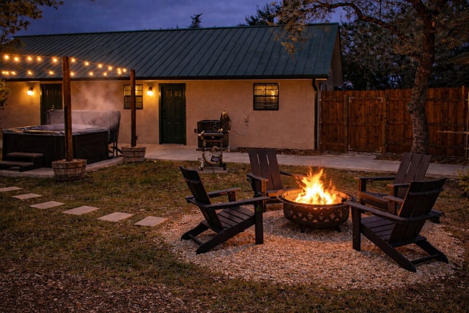 Gather around the fire pit after dark — string lights, s`mores, and Hill Country skies