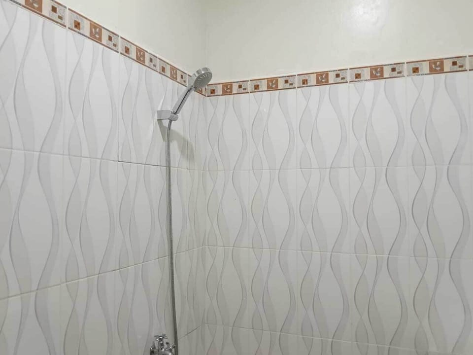 Deluxe Double Room, 1 Queen Bed, Patio | Bathroom | Shower, free toiletries, towels, soap