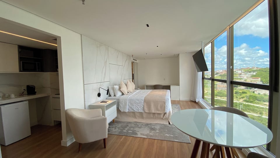 Executive Studio Suite | Minibar, in-room safe, individually furnished, soundproofing