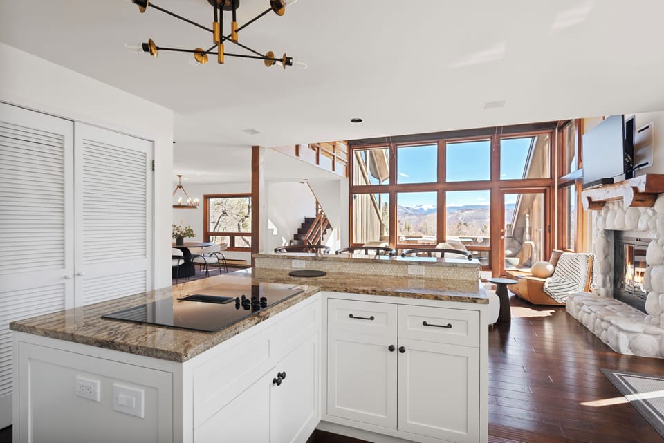 Beautiful kitchen with new stainless steel appliances and views of the valley beyond.