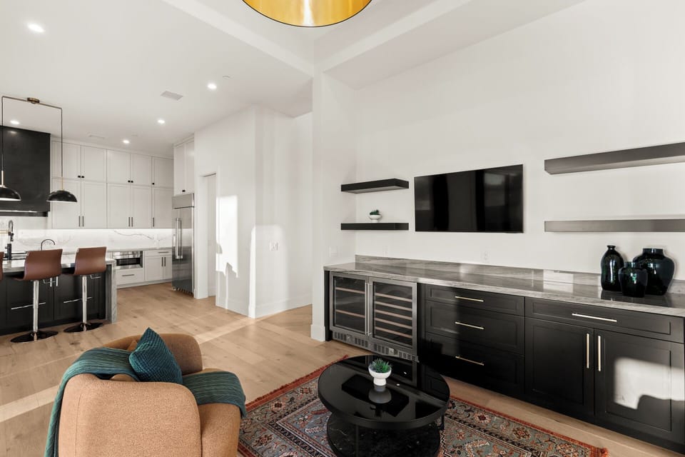 Entertain with flair at a designer bar with plenty of prep and storage.