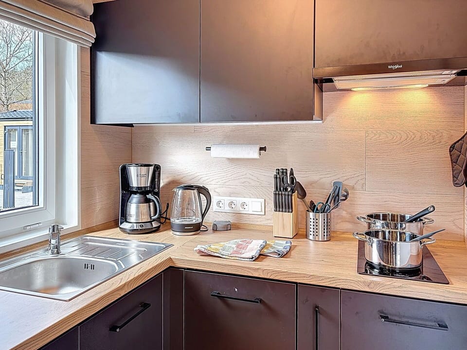 Kitchen Appliance, Kitchen, Countertop, Cabinetry, Interior Design, Major Appliance, Home Appliance, Furniture, Wood, Plumbing Fixture