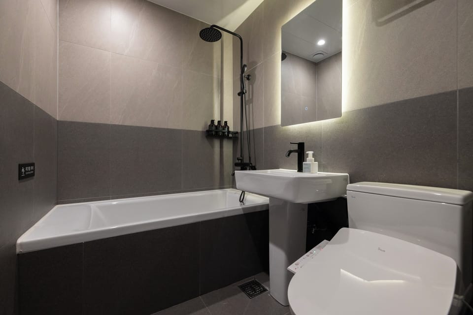 Hair dryer, towels, soap, shampoo