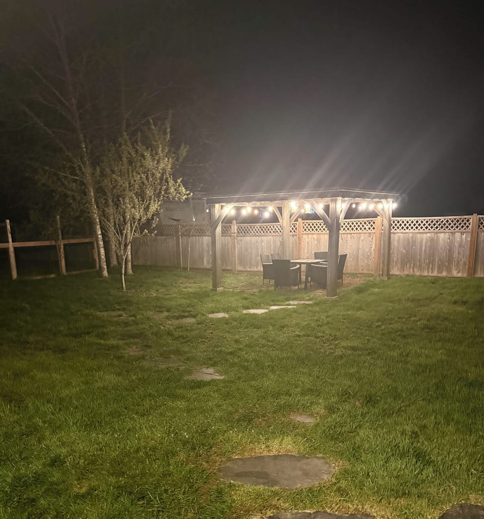 Outdoor gazebo with table and chairs - lights for night time