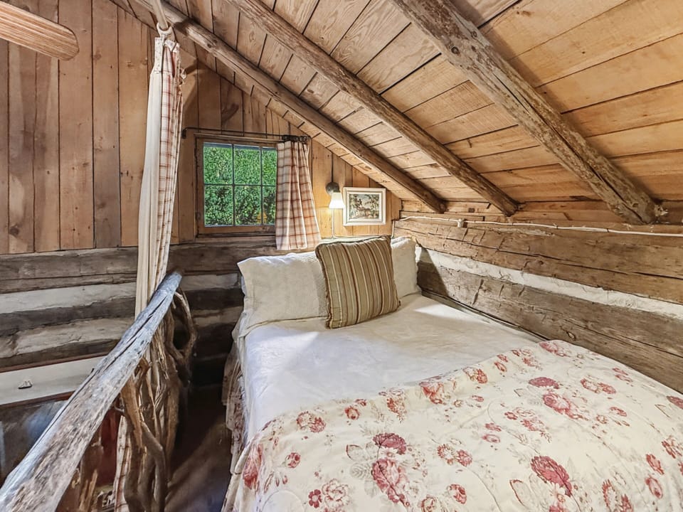 Upstairs- additional double bed for 3rd guest or child. Does not have a closet- dresser in hall for clothing. No door. Curtains to surround space for privacy