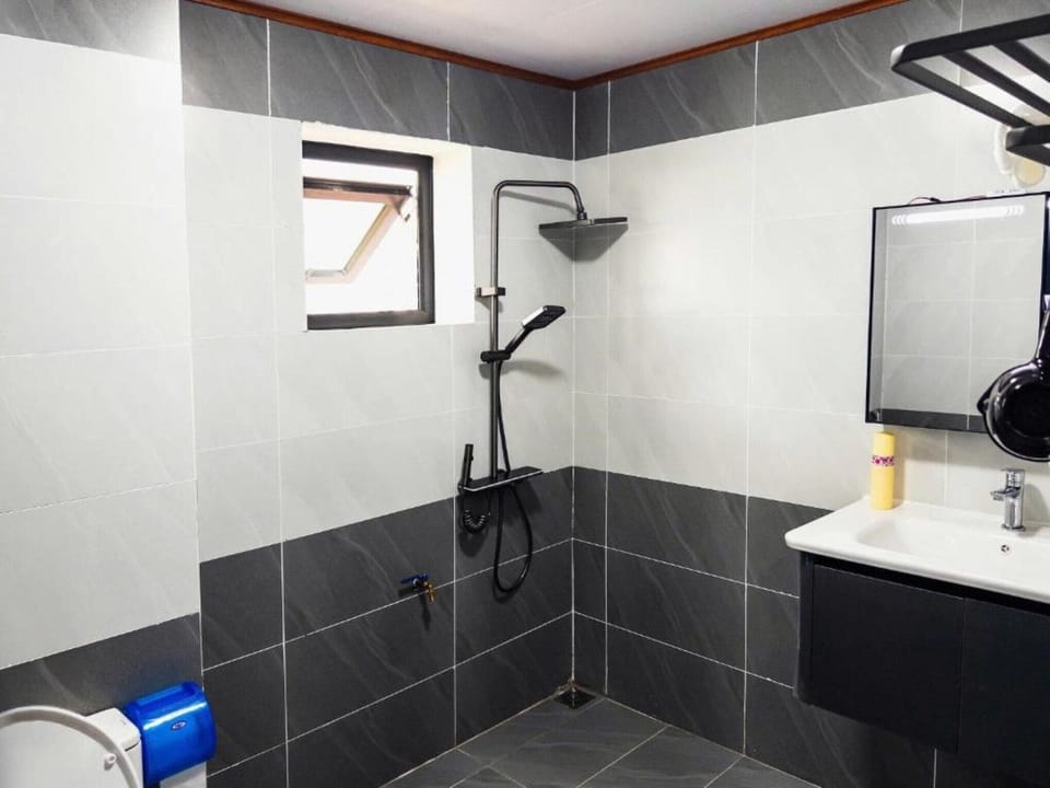 Shower, free toiletries, hair dryer, slippers