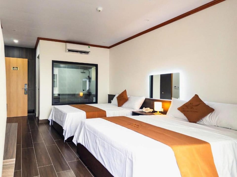 Triple Room, Balcony | Minibar, desk, free WiFi, bed sheets