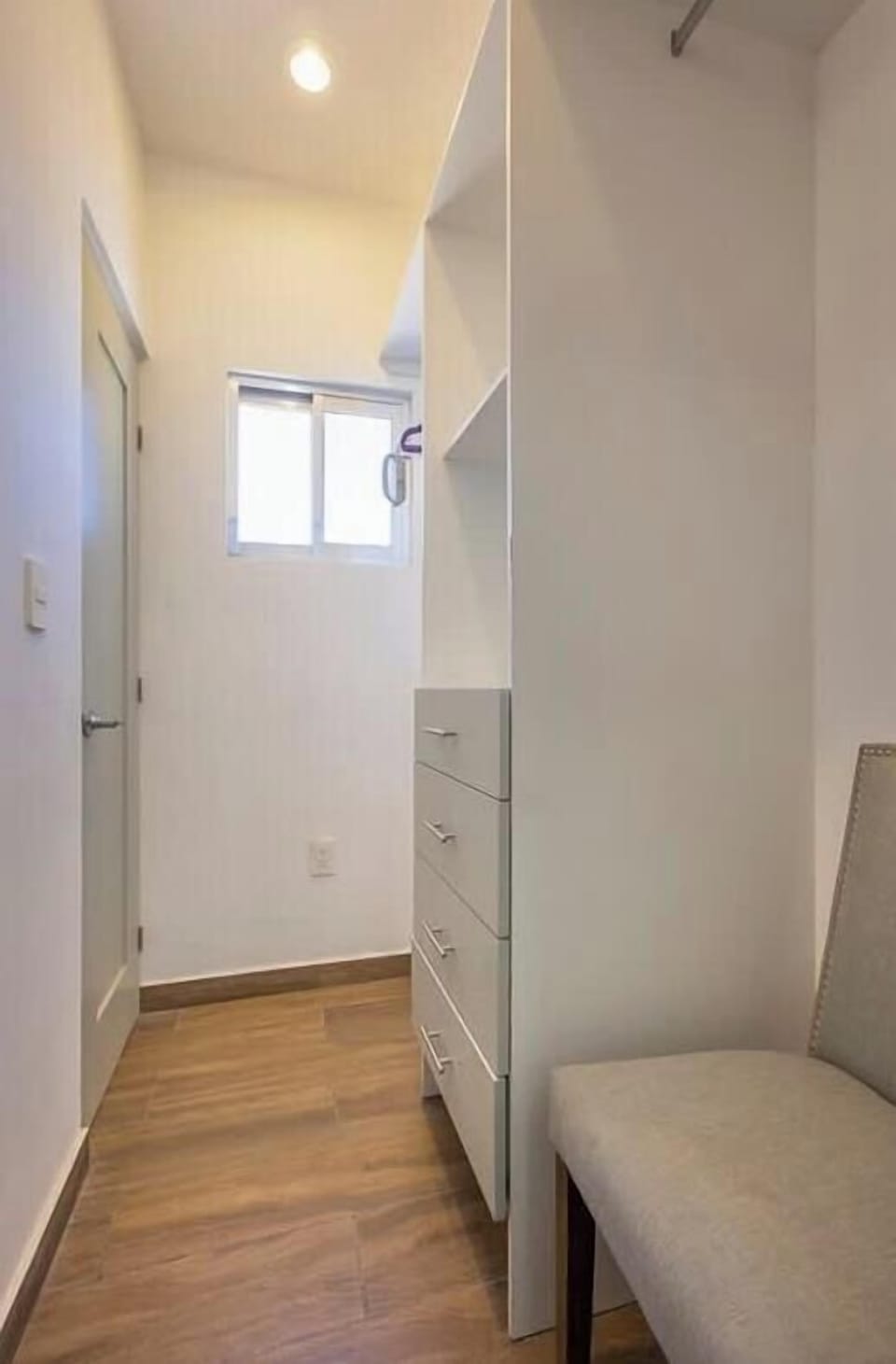 Head through the closet to Bathroom 2