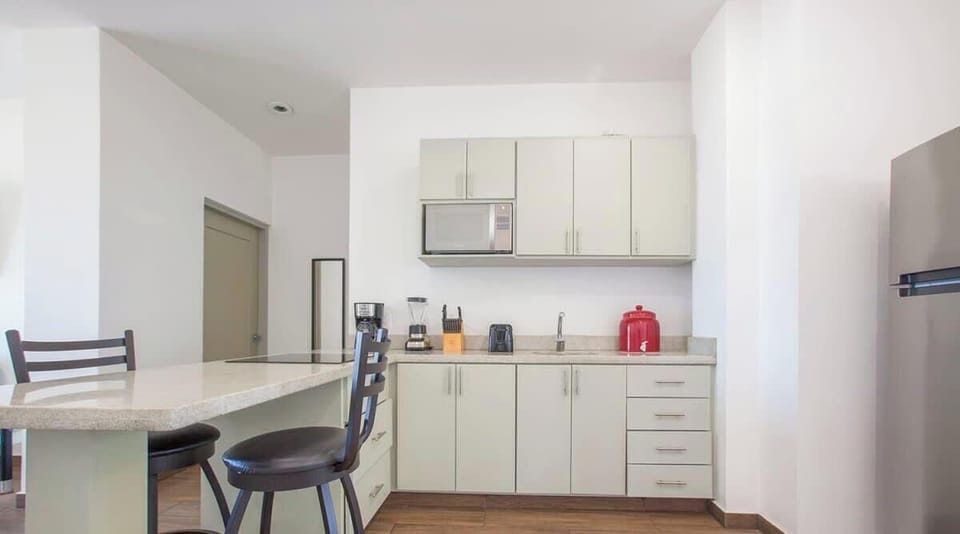 The kitchen is well equipped for preparing food at home