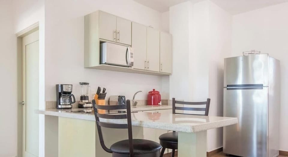 Cook up something at home & eat at the kitchen bar